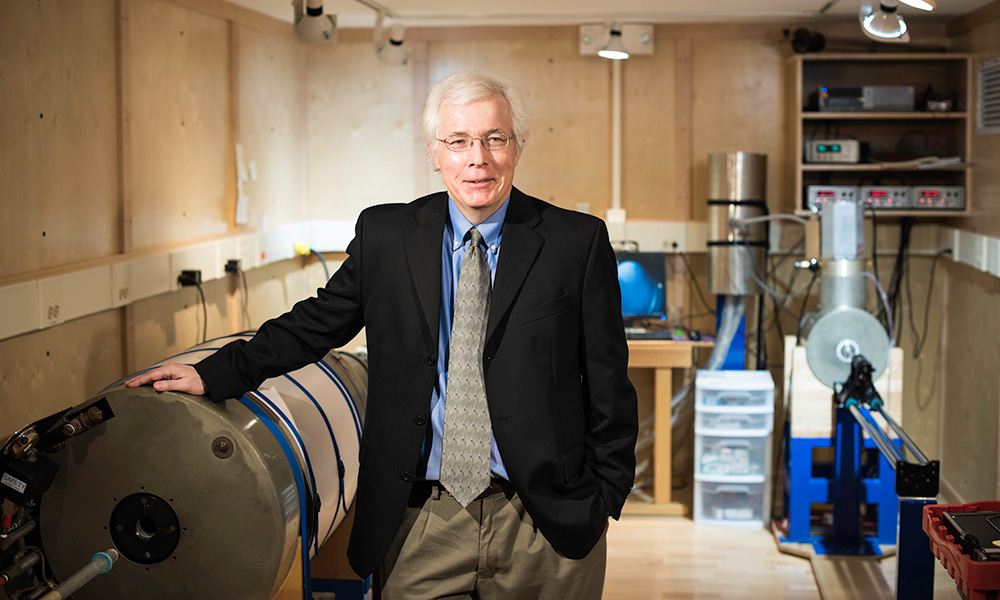 John Tarduno standing in a workshop.