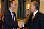 Presidents Seligman and Jackson shaking hands