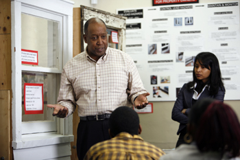 man gives presentation about lead poisoning