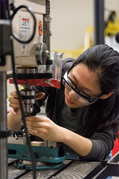 Students using a drill press