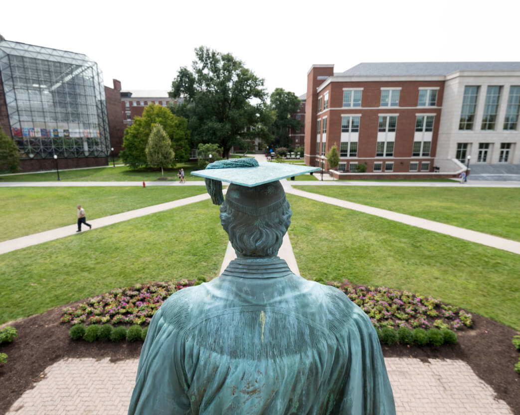 Statue of Martin Brewer Anderson and view of University of Rochester campus