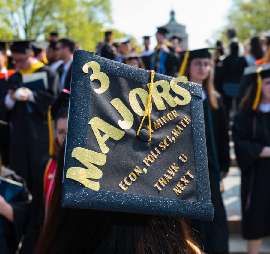Graduation cap with multi-disciplinary study focus at University of Rochester