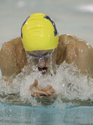 Jensen was fourth in the 100 breaststroke.