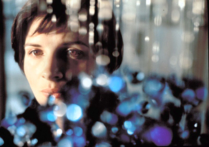 Screenshot of Three Colors: Blue. A woman looking past camera.