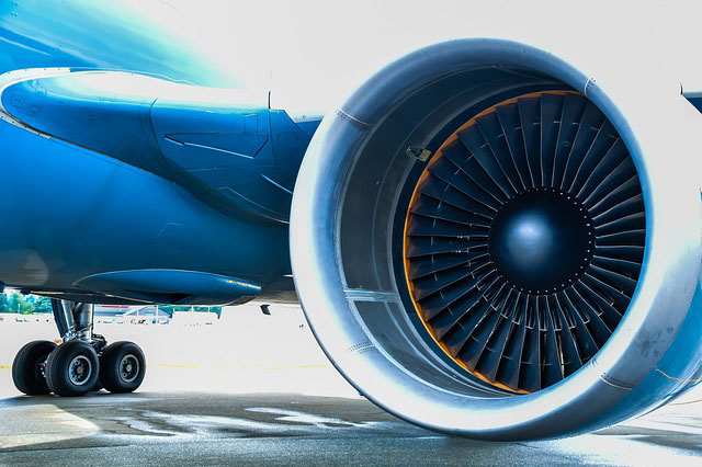 A close up view of an engine on a jet airplane.