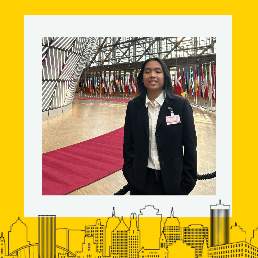The recipient smiling at the camera with a thick yellow border around the image.