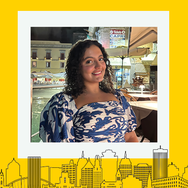 The recipient smiling at the camera with a thick yellow border around the image.