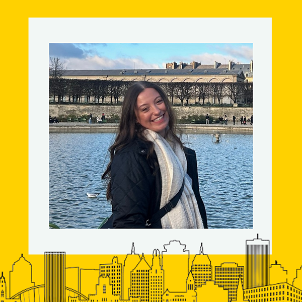 The recipient smiling at the camera with a thick yellow border around the image.