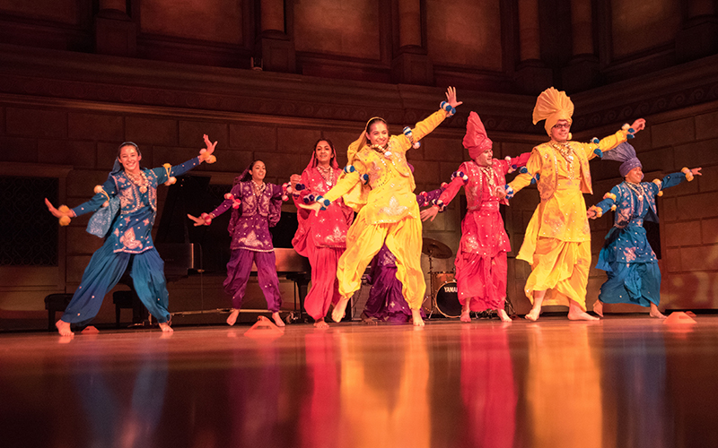 Photo of the dance group Rochester Bhangra performing during Celebrate Diversity at a past Fall Welcome Week