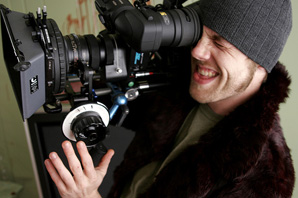 Man Filming with Video Camera
