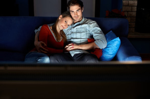Couple Cuddling on Couch