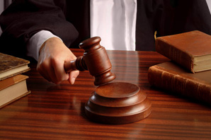 Judge's Hand Striking Gavel