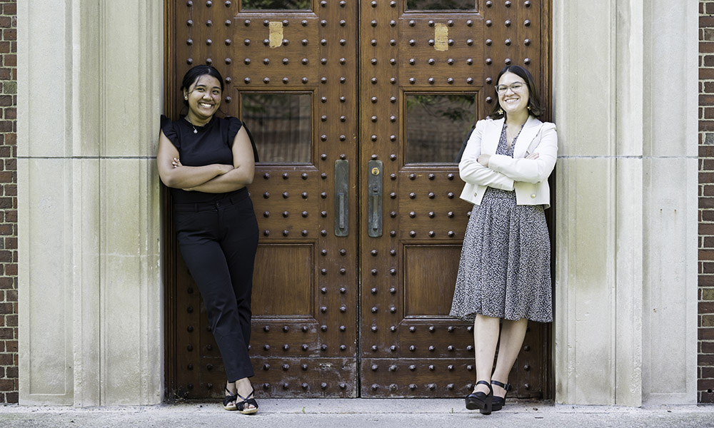 Mara Criollo-Rivera (RIGHT) and Kristel Kezia Sagabaen Layugan are pictured outside Dewey Hall.