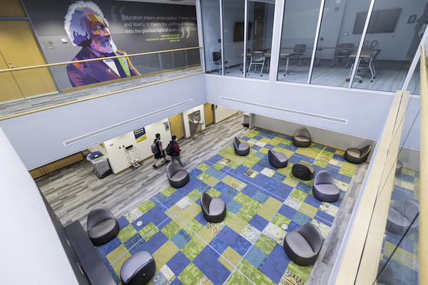A sky view of the Douglass Community Room with a colorful F. Douglass mural featured on the top