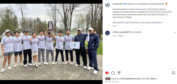 University of Rochester men's golf team members holding Liberty League championship trophy