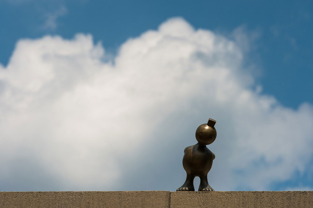 small brass sculpture atop Memorial Art Gallery