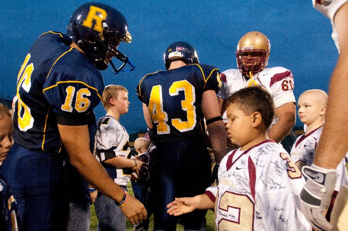 kids shake players hands