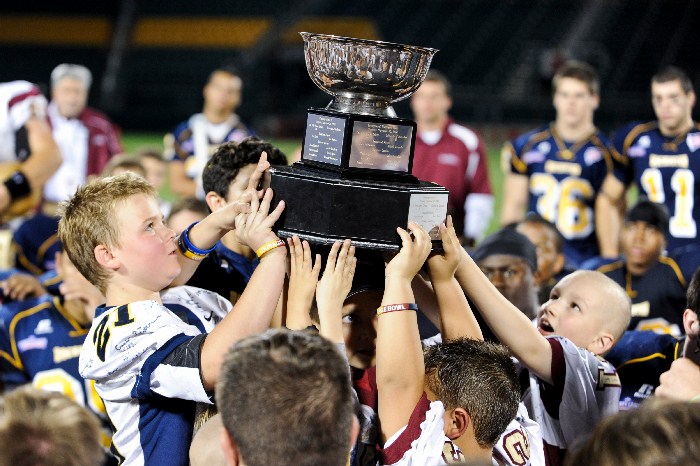 kids holding trophy