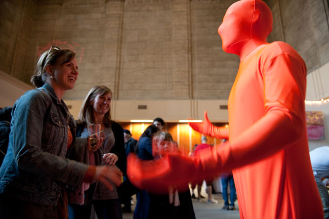 Orange Man greets Art Awake attendees