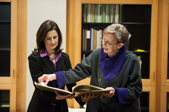 Nora Walter presents book to Mary Ann Mavrinac