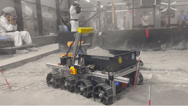 GIF of Melbot V3 dumping regolith on a lunar-like terrain during the 2024 NASA Lunabotics Challenge competition.