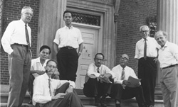 R: Rochester Conference on High-Energy Physics—Nobel Prize–winning attendees of the 10th annual conference included (left to right) Emilio Segre, Chen Ning Yang, Owen Chamberlain, Tsung Dao Lee, E. M. McMillan, Carl D. Anderson, I. I. Rabi, and Werner Heisenberg.