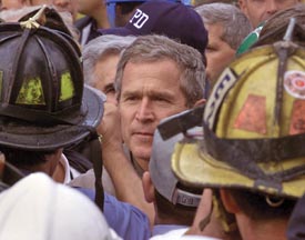 Bush with firemen
