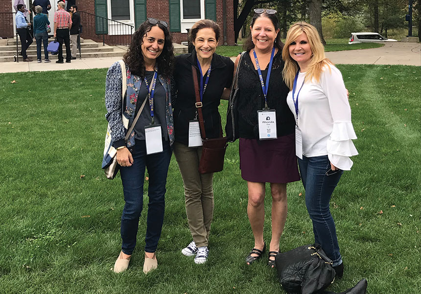 photo of University of Rochester alumni, including the late Rhond Ores with classmates Marian Tanofsky-Kraff, Lorin Armanini Donnelly, and Jill Siegel on campus for Meliora Weekend