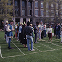 photo of members of Russell Peck’s class on the Eastman Quadrangle