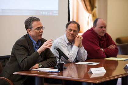 panel of researchers speaking at a workshop