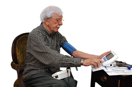 patient using health buddy device