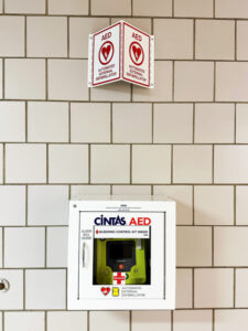White box housing an automated external defibrillator (AED) on River Campus at the University of Rochester.
