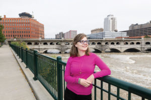 Caitlin Meives standing in front of Genesee River