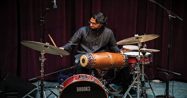 Rohan Krishnamurthy ’13E (PhD) playing the drums
