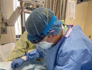 Dr. Gary Gwertzman performing a surgery