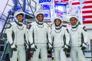 Josh Cassada ’00 (PhD) (second from left) and SpaceX astronauts Anna Kikina, Nicole Mann, and Koichi Wakata suited up to test equipment at SpaceX headquarters in California in the days leading up to their October mission to the International Space Station.