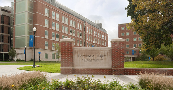 School of Engineering Hajim quad with Edmund A. Hajim engraved wall in front