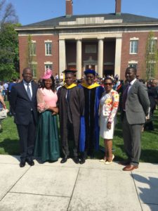 Olatunde Oshunlaja and his parents, Anthony and Olajumoke Oshunlaja, with Lance and Hope Drummond at Olatunde's graduation