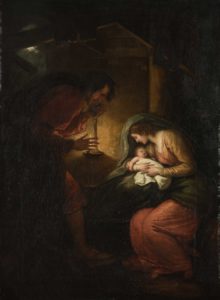 painting of a woman shrouded in blue holding her newborn baby, while a man looks on holding a candle