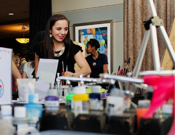 Sophia Rosman working her booth during the Maker Faire