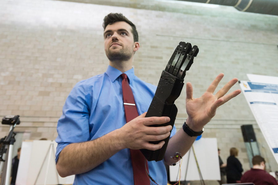 Mechanical engineering student with prosthetic arm at University of Rochester Hajim School of Engineering and Applied Sciences
