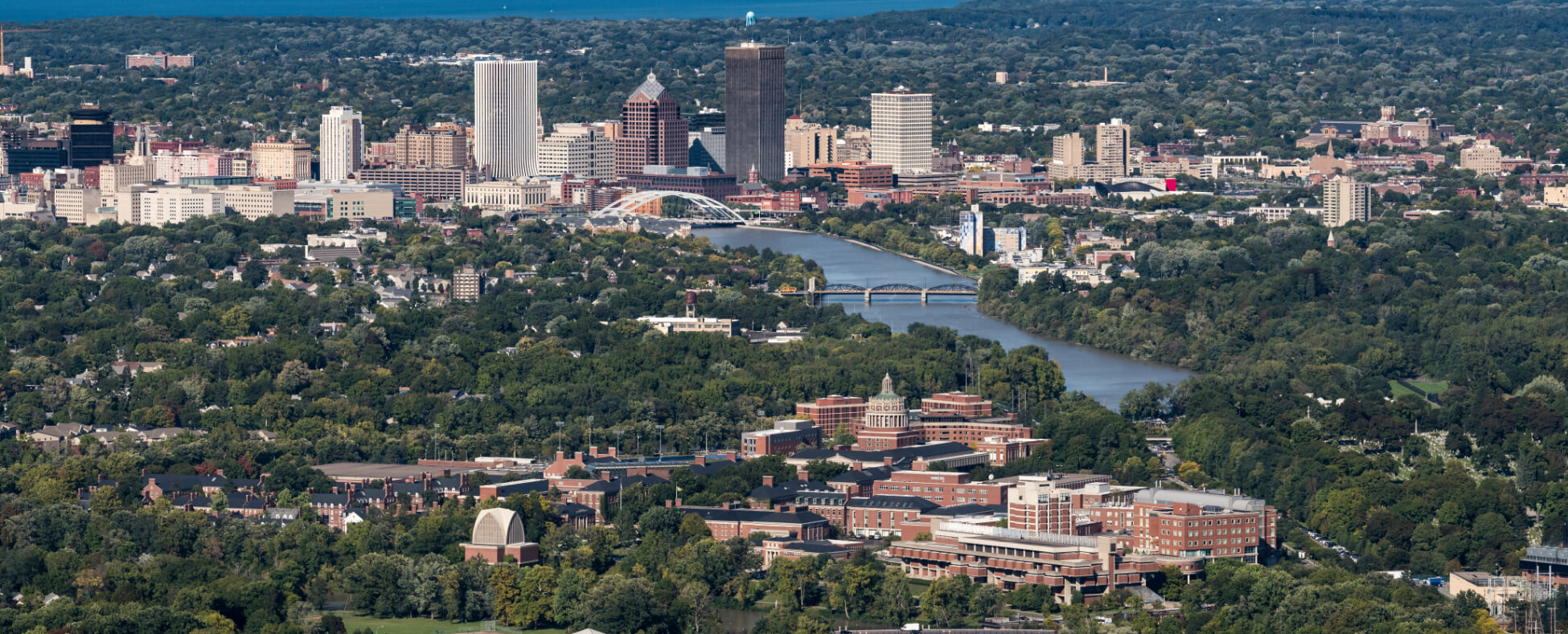 Aerial image of University of Rochester with city of Rochester in background
