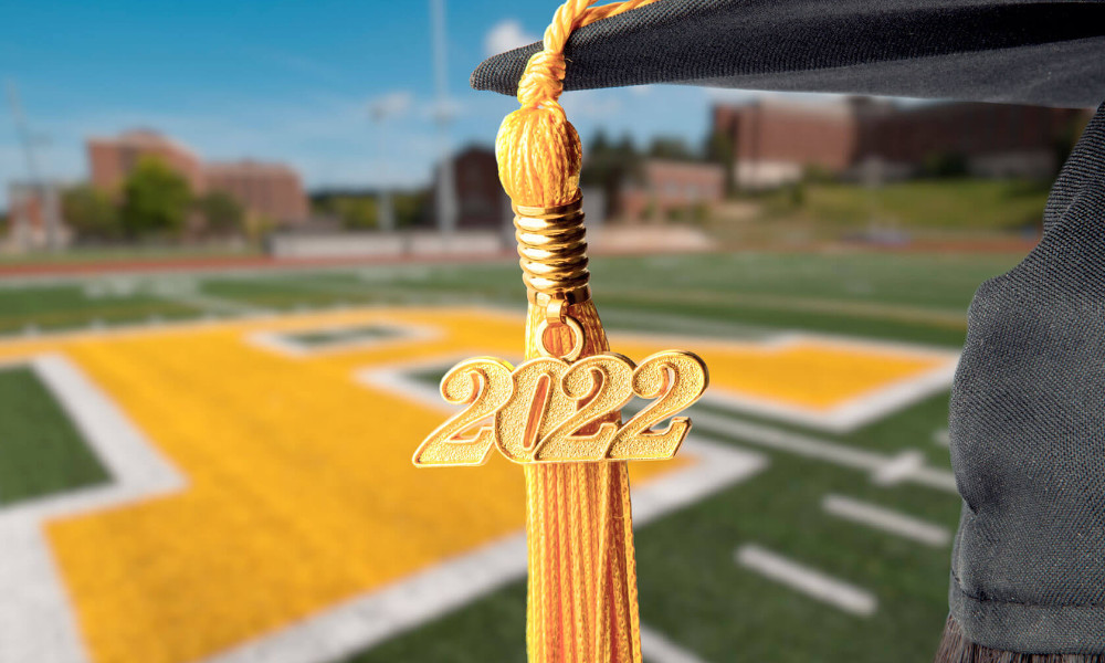 A Class of 2022 tassel with Fauver Stadium in the background.