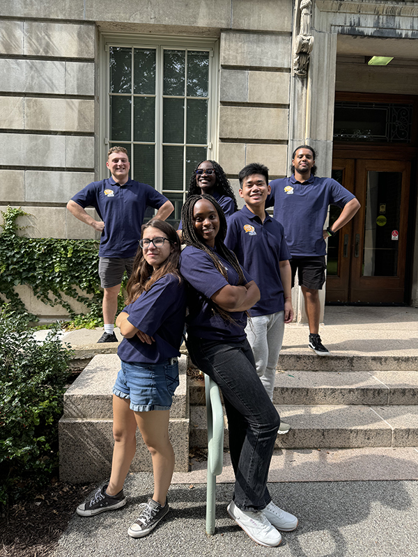 The 2024 peer advisors pose for the camera outside Lattimore Hall.