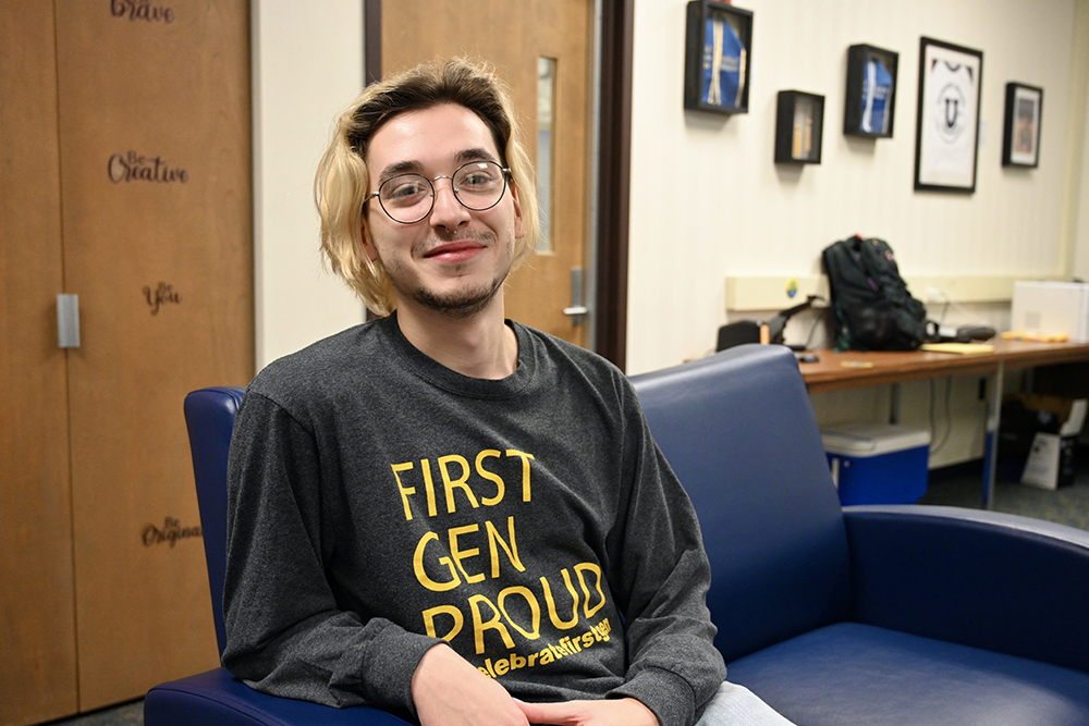 Dariel Guerra sits in the living room of the Kearns Center during First-Gen Week, November 2023.