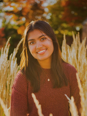 Annapurna Chakraborty smiling.
