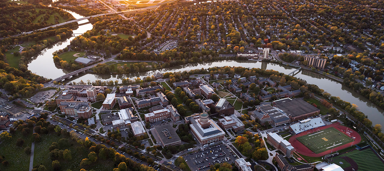An aerial view of the River Campus at sunset.