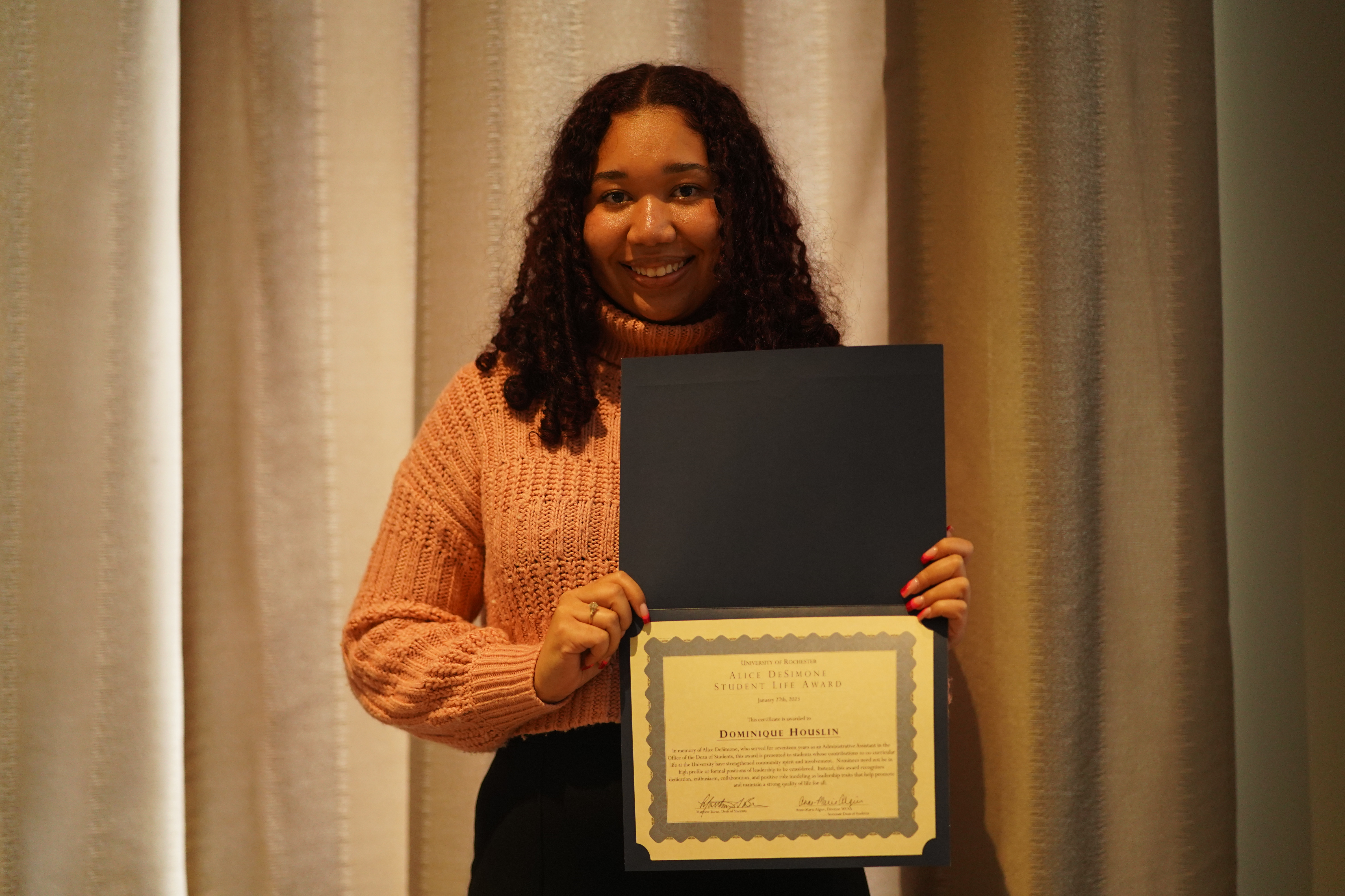 Dominique Houslin accepting Award