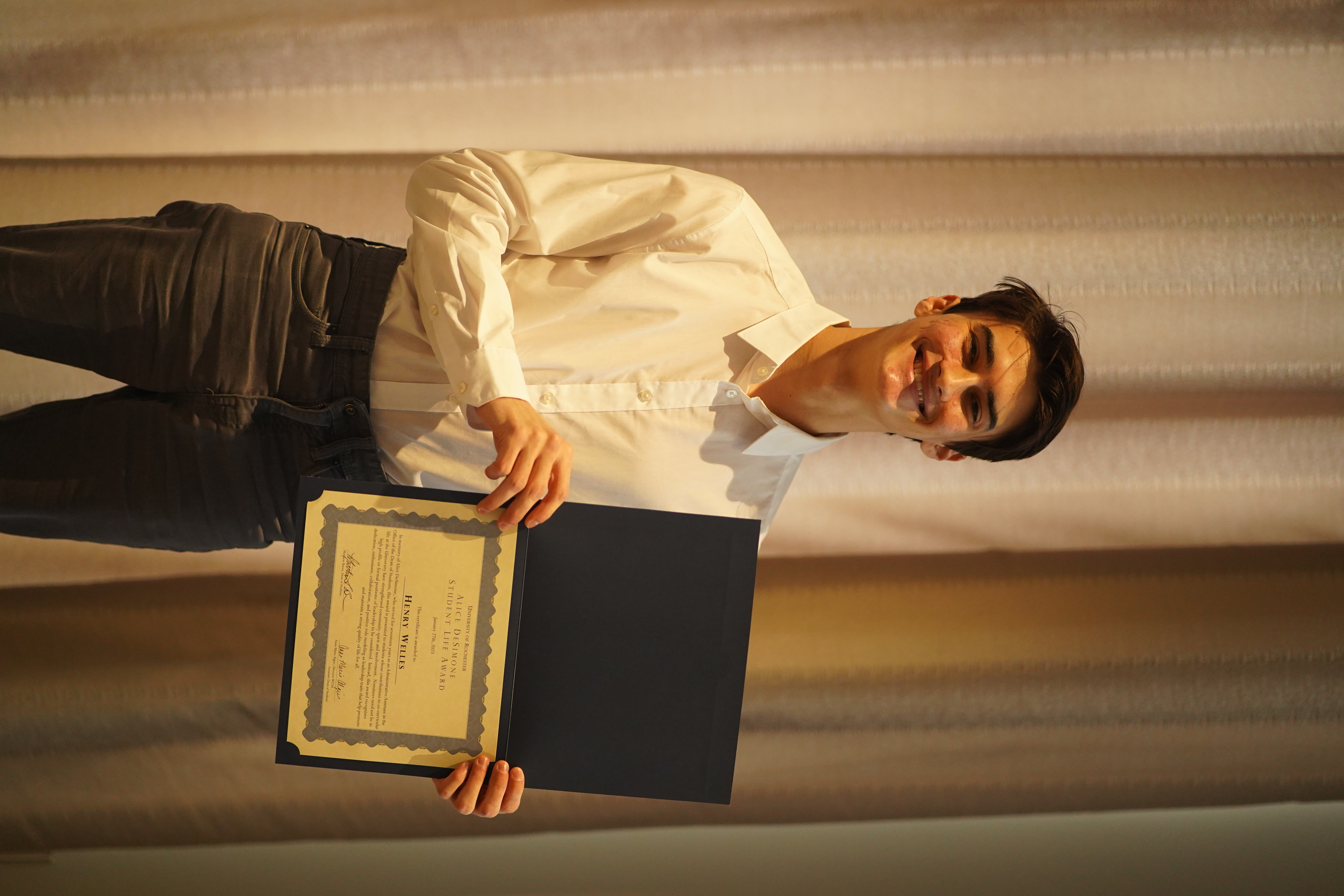 Henry Welles accepting award