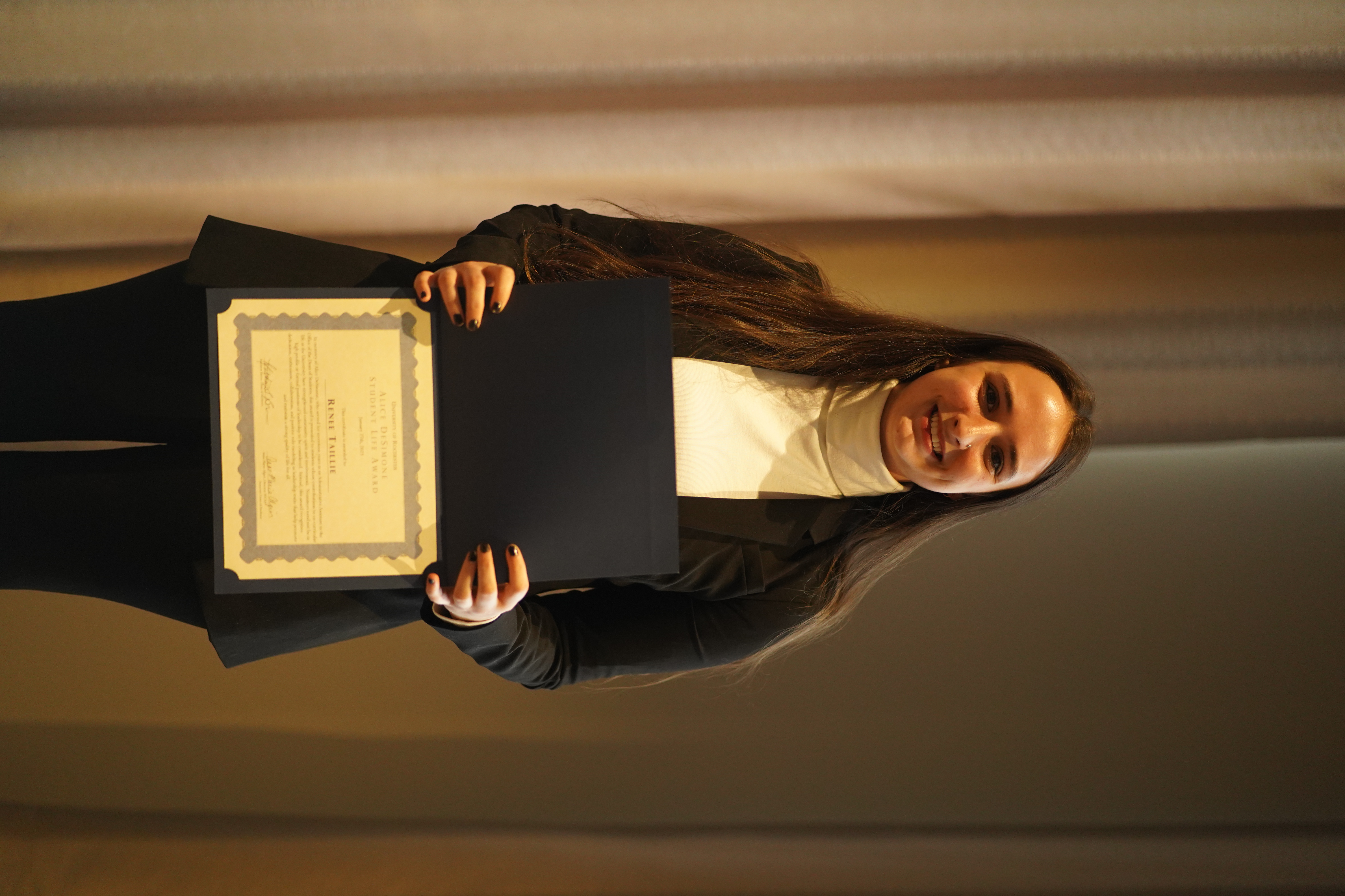 Renee Taillie accepting award